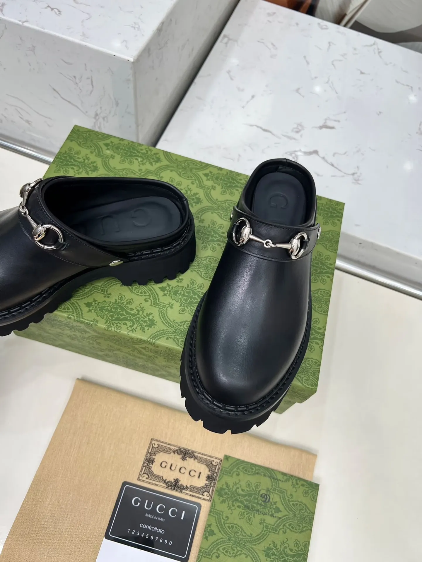 👟👟Ex-factory price 480👟👟 GUCCI British-style fashion slippers, lazy design back stumbling ➕thick sole increased height, empty back shape looming with exposed ankles, super cool when walking, age-neutral style, wide audience, Fabric: cowhide, mercerized cow suede Lining/foot pad: cowhide Outsole: foam outsole Heel height: 5cm Number of yards: 35-42 (customized numbers at both ends) Color: 4 colors available: black, brown, and military green Packing: card, bag